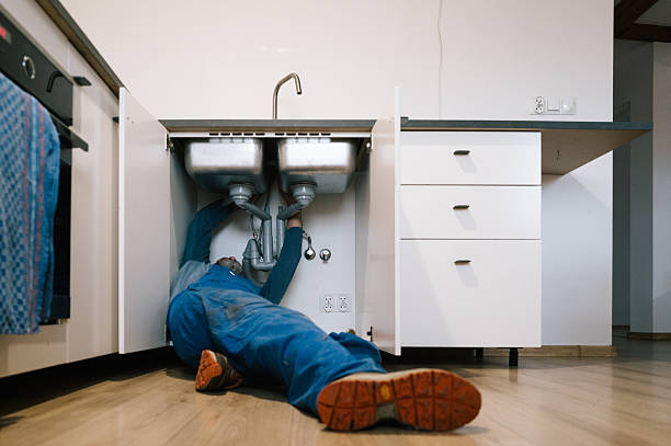 Professional Drain Cleaning technician working in Elwood, KS